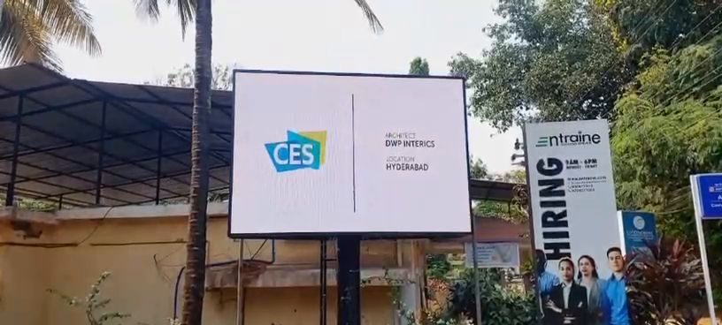 Freestanding outdoor LED screen at an office campus entrance