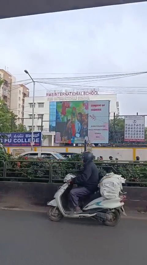 Roadside LED billboard outside a school campus
