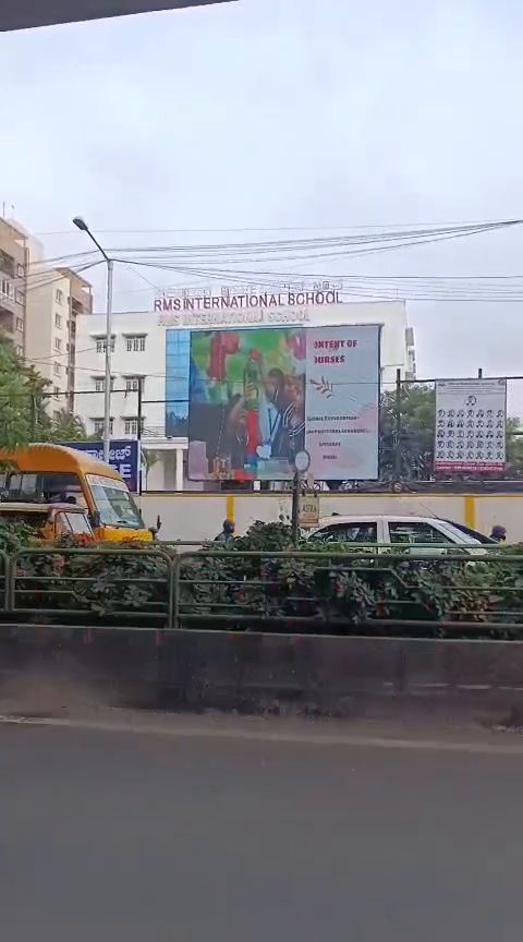 Roadside LED billboard outside a school campus