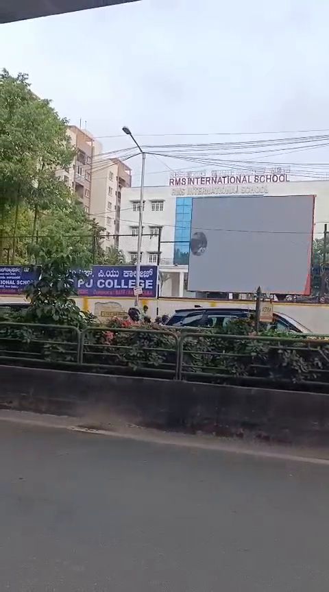 Roadside LED billboard outside a school campus