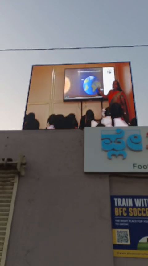 LED display mounted on a school building exterior