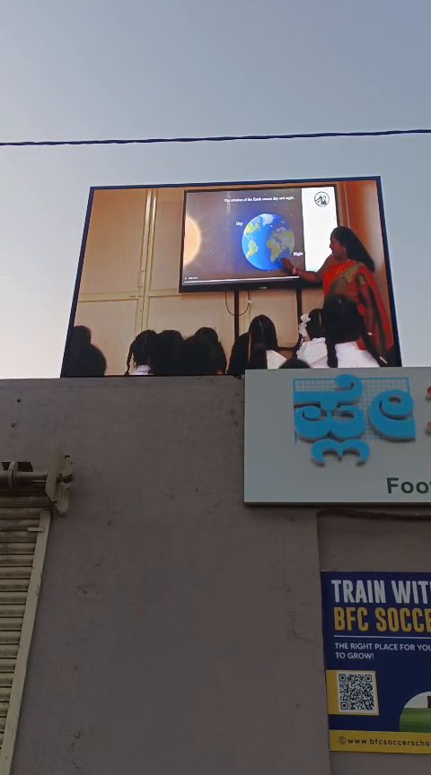 LED display mounted on a school building exterior