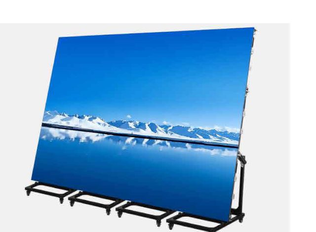 Three LED poster panels joined on a wheeled floor stand showing a mountain scene