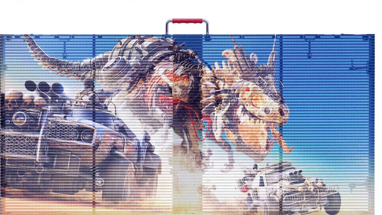 Transparent LED panel with a carry handle, artwork showing through the panel